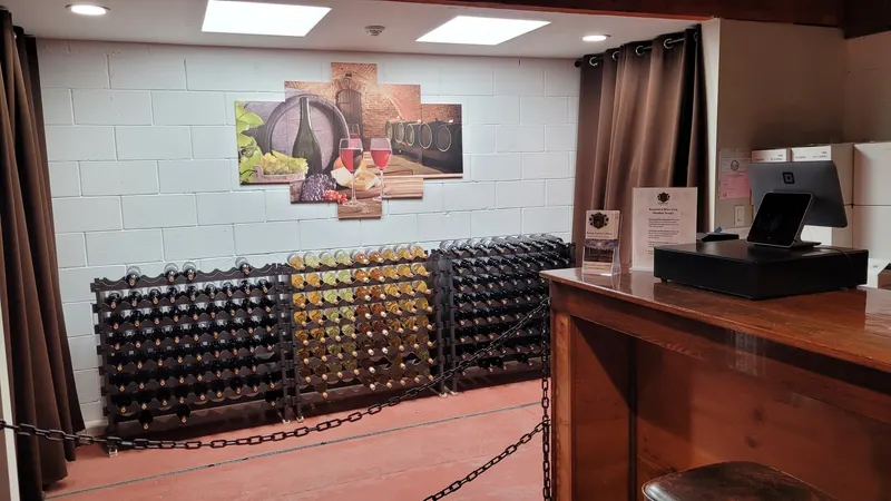 Wine bottle racks and barrel artwork in the speakeasy tasting room at Morton Family Cellars, Camino CA